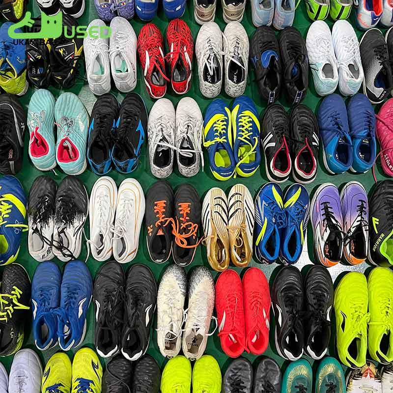Brightly colored second-hand soccer shoes